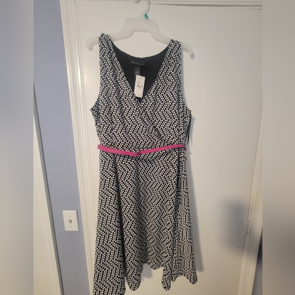 Elegant Black and White Patterned Dress with Pink Accent